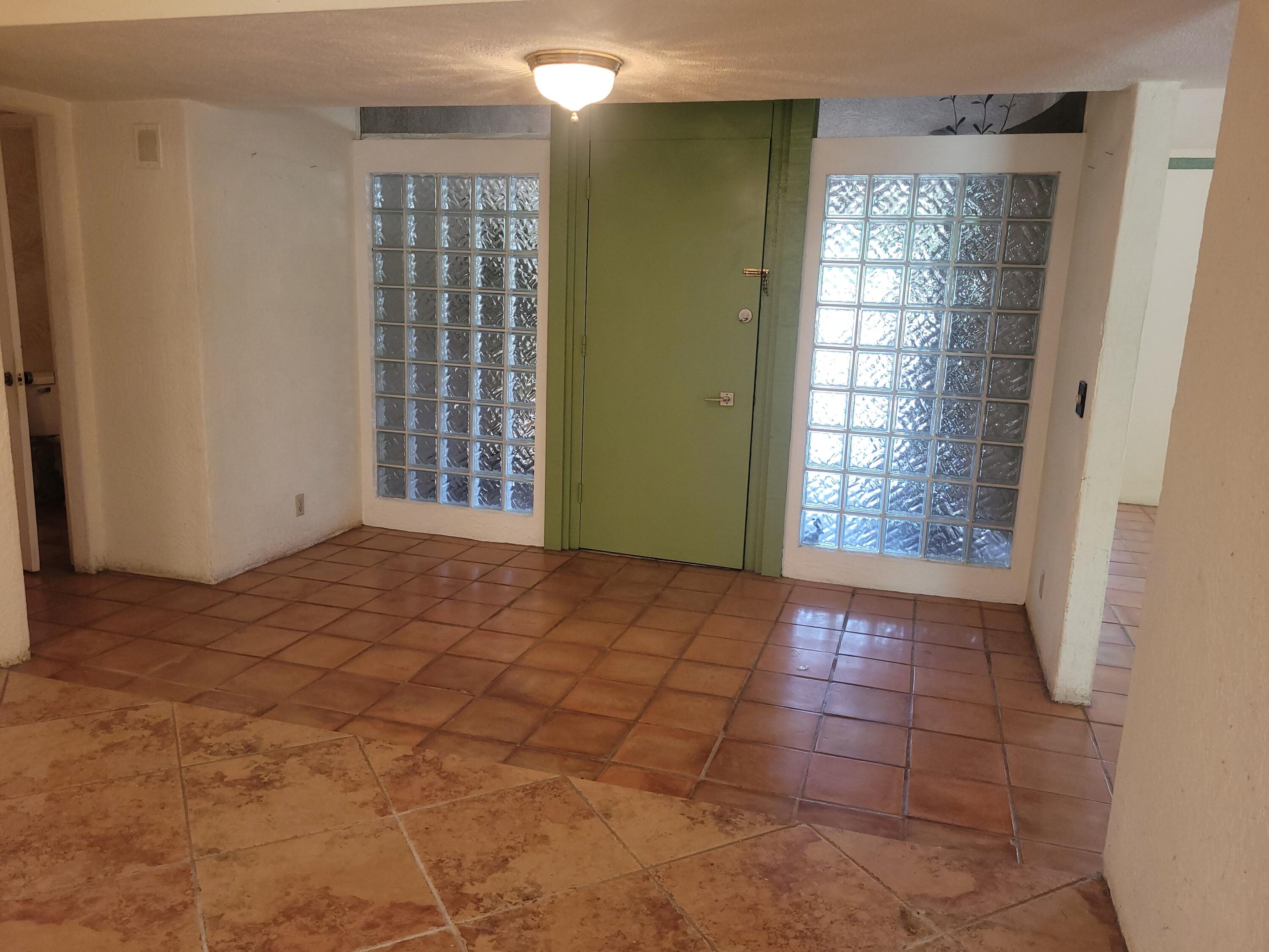 70380 Chappel Road Rancho Mirage, CA 92270 - Photo 19 of 30 a view of an empty room with window and bathroom