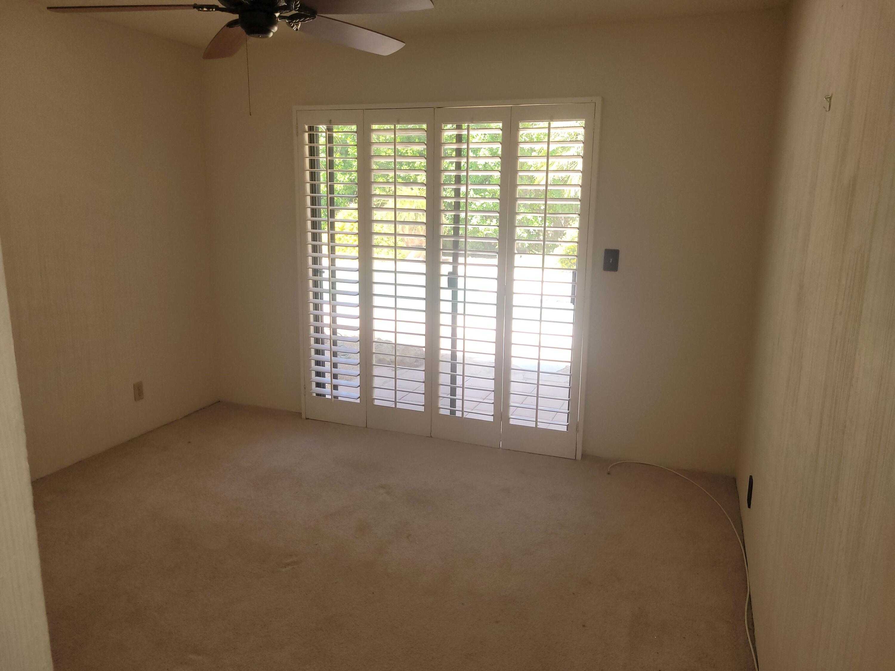 70380 Chappel Road Rancho Mirage, CA 92270 - Photo 22 of 30 a view of an empty room with a window