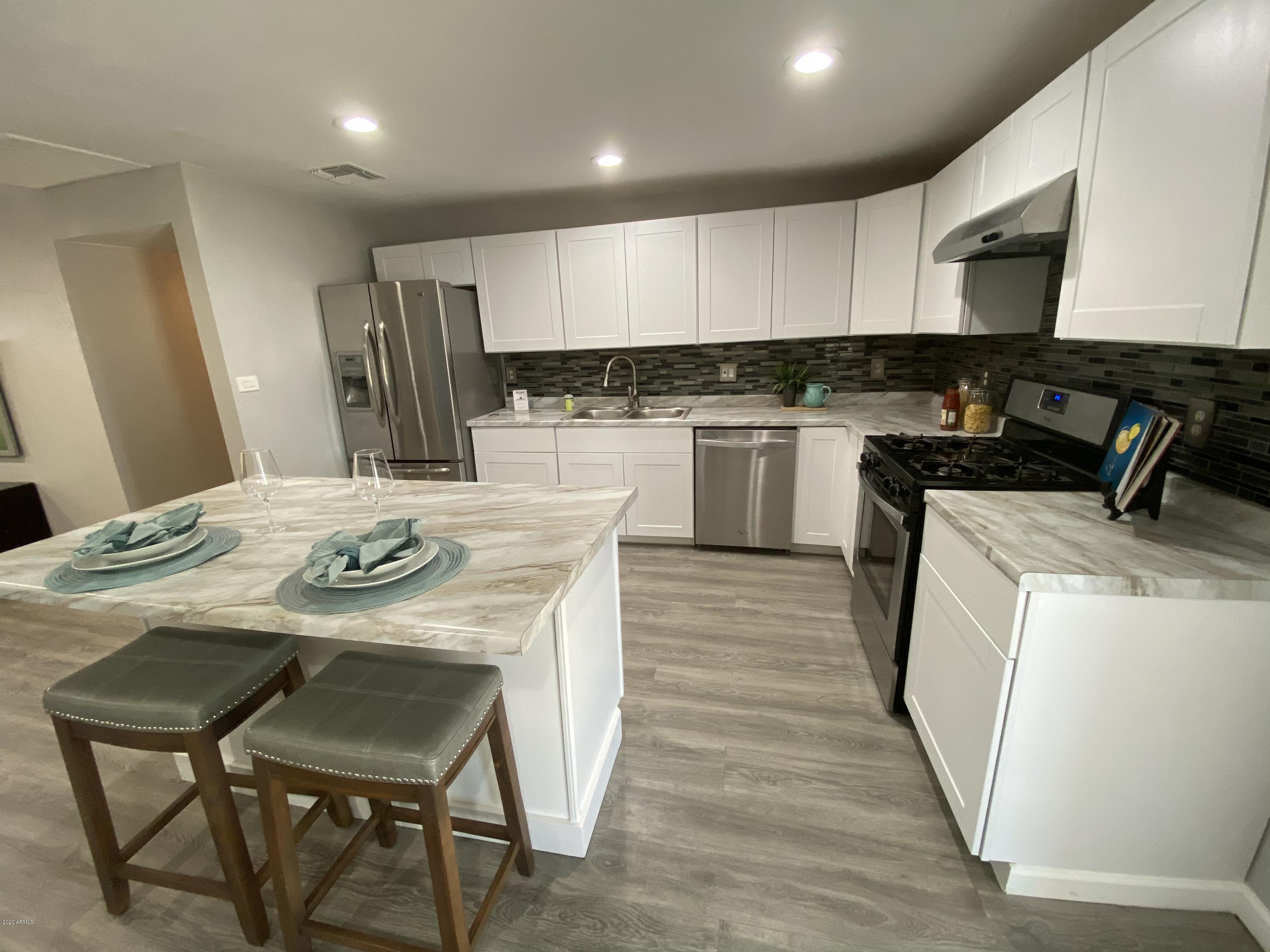 6514 West Granada Road Phoenix, AZ 85035 - Photo 8 of 27 B7F32C09-6E83-453B-BCEF-95C890D5A8C3