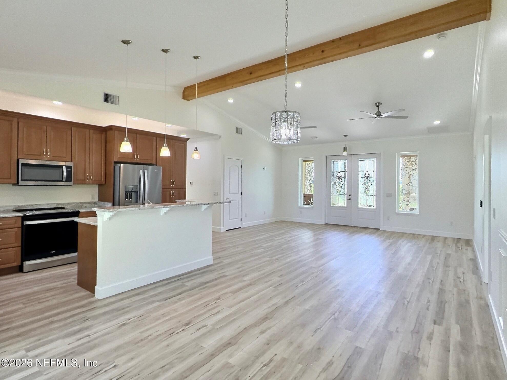 159 Mays Cove Road East Palatka, FL 32131 - Photo 60 of 62 a view of kitchen with cabinets and wooden floor