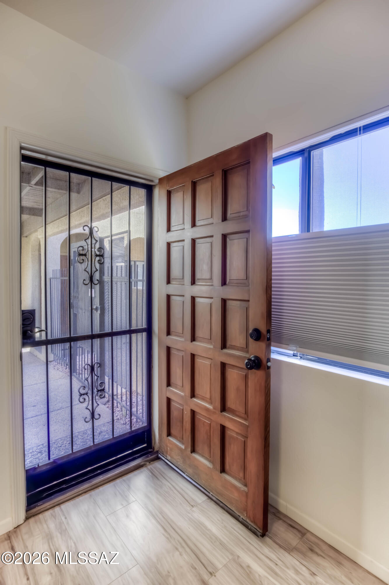 5500 North Valley View Road, Unit 123 Tucson, AZ 85718 - Photo 24 of 36 a view of entryway with wooden floor