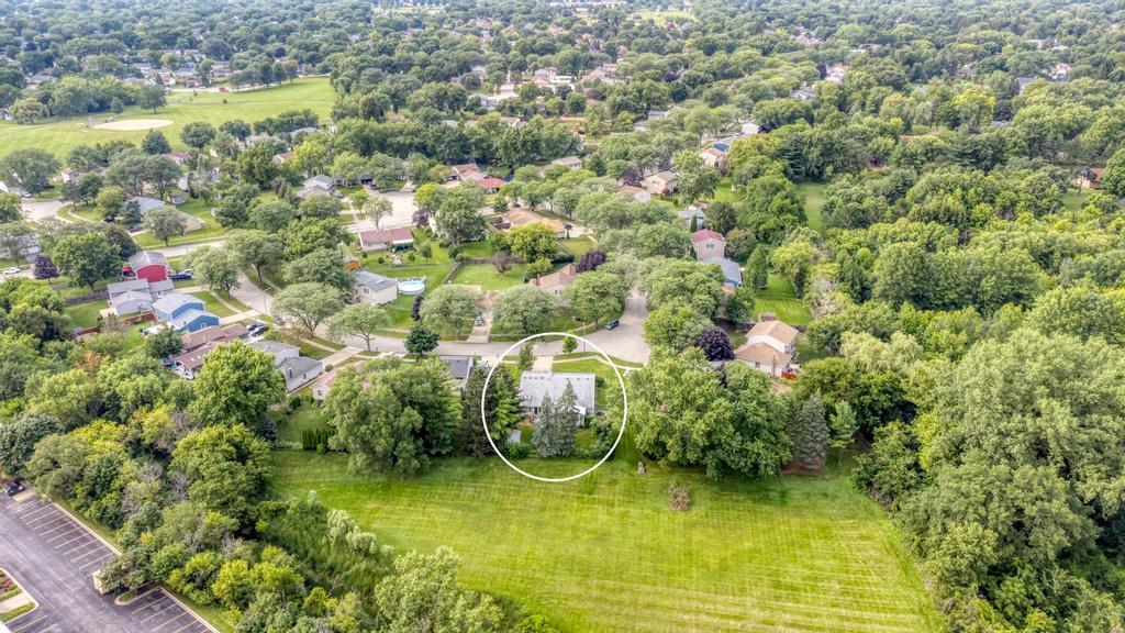 457 Fall Circle Roselle, IL 60172 - Photo 37 of 37 a view of a lake with houses