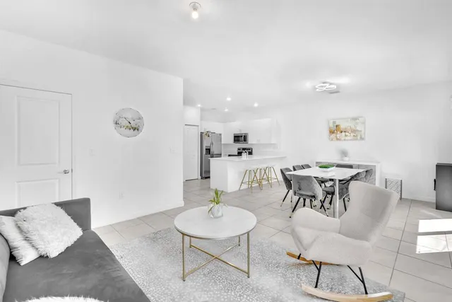 a view of a dining room with furniture