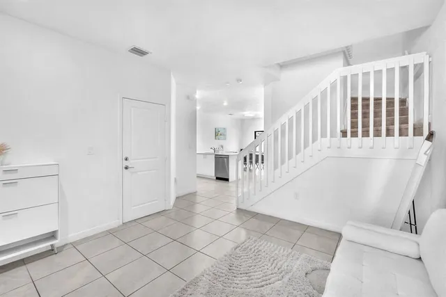 a view of entryway with wooden floor