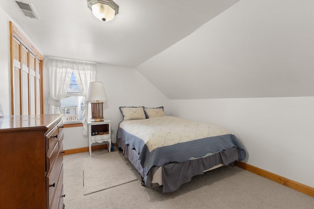 35 Lafayette Road Salisbury, MA 01952 - Photo 18 of 40 a bedroom with a bed and a window