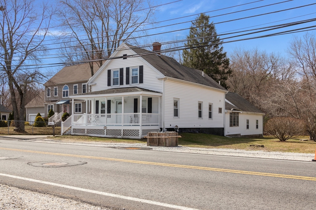 35 Lafayette Road Salisbury, MA 01952 - Photo 2 of 40 a view of a white house with a large trees next to road