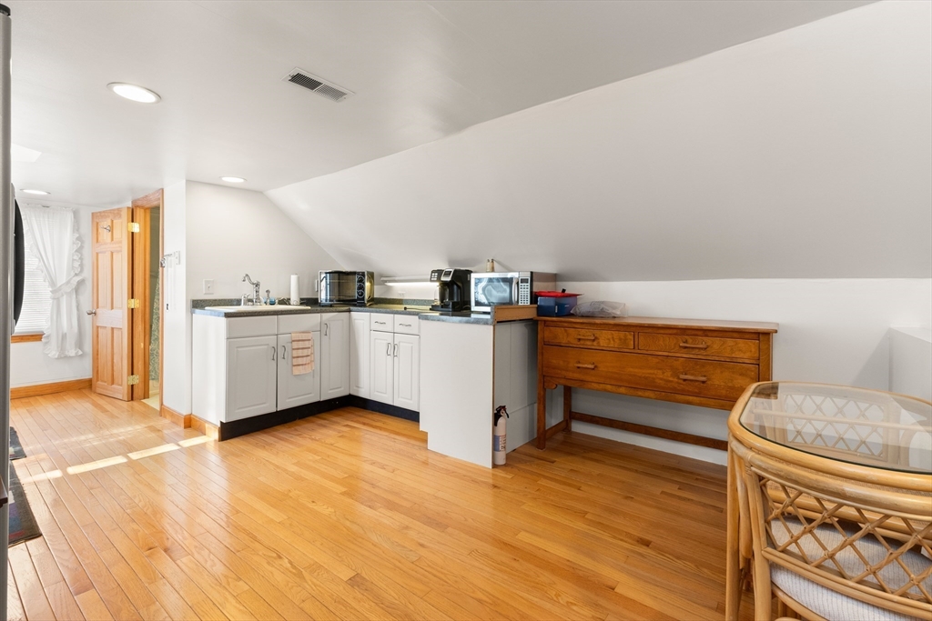 35 Lafayette Road Salisbury, MA 01952 - Photo 22 of 40 a kitchen with stainless steel appliances a sink and a stove