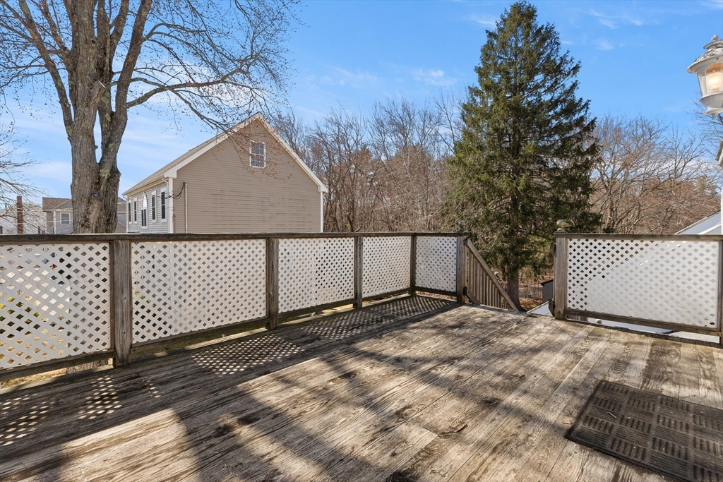 35 Lafayette Road Salisbury, MA 01952 - Photo 26 of 40 a backyard of a house with wooden fence