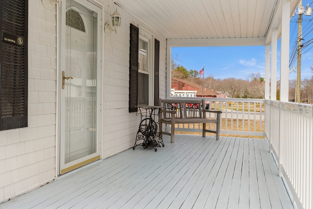 35 Lafayette Road Salisbury, MA 01952 - Photo 32 of 40 a view of a balcony with furniture and wooden floor