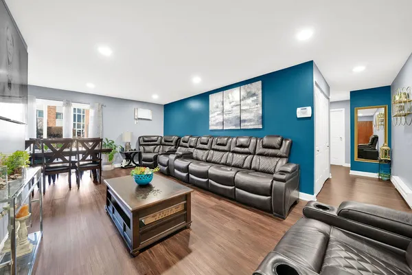 a living room with furniture and a table