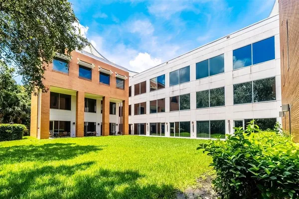 a large building with a yard
