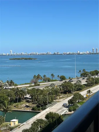 a view of a city and ocean view