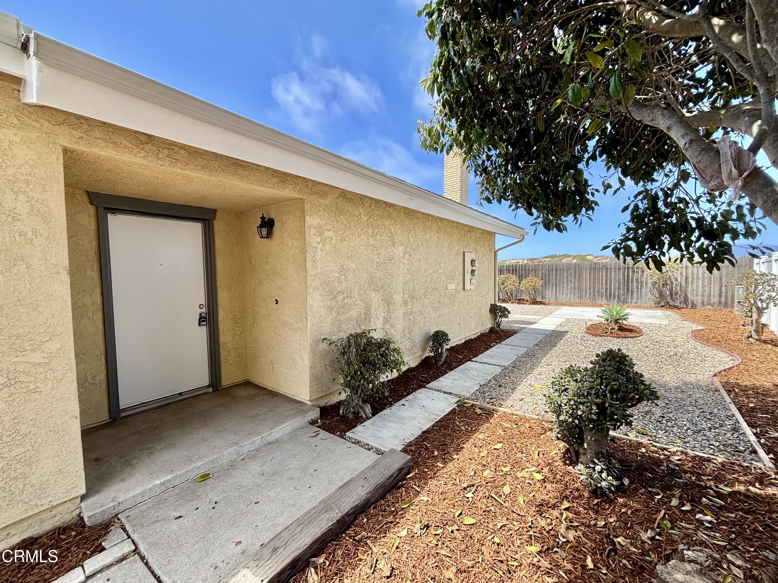 4911 Catamaran Street Oxnard, CA 93035 - Photo 35 of 38 a front view of a house