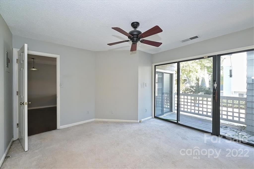 222 Queens Road, Unit 56 Charlotte, NC 28204 - Photo 14 of 23 a view of an empty room and window
