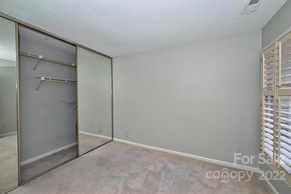222 Queens Road, Unit 56 Charlotte, NC 28204 - Photo 19 of 23 a view of an empty room