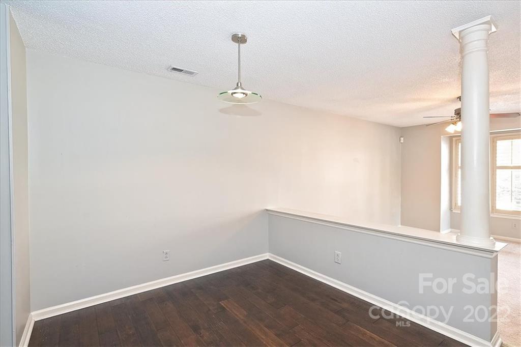 222 Queens Road, Unit 56 Charlotte, NC 28204 - Photo 6 of 23 an empty room with a empty space and a window
