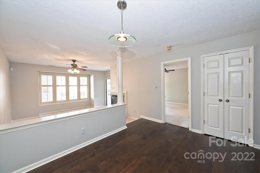 222 Queens Road, Unit 56 Charlotte, NC 28204 - Photo 7 of 23 a view of an empty room with a window