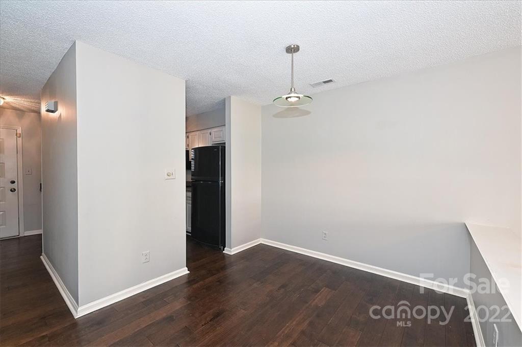 222 Queens Road, Unit 56 Charlotte, NC 28204 - Photo 8 of 23 a view of an empty room
