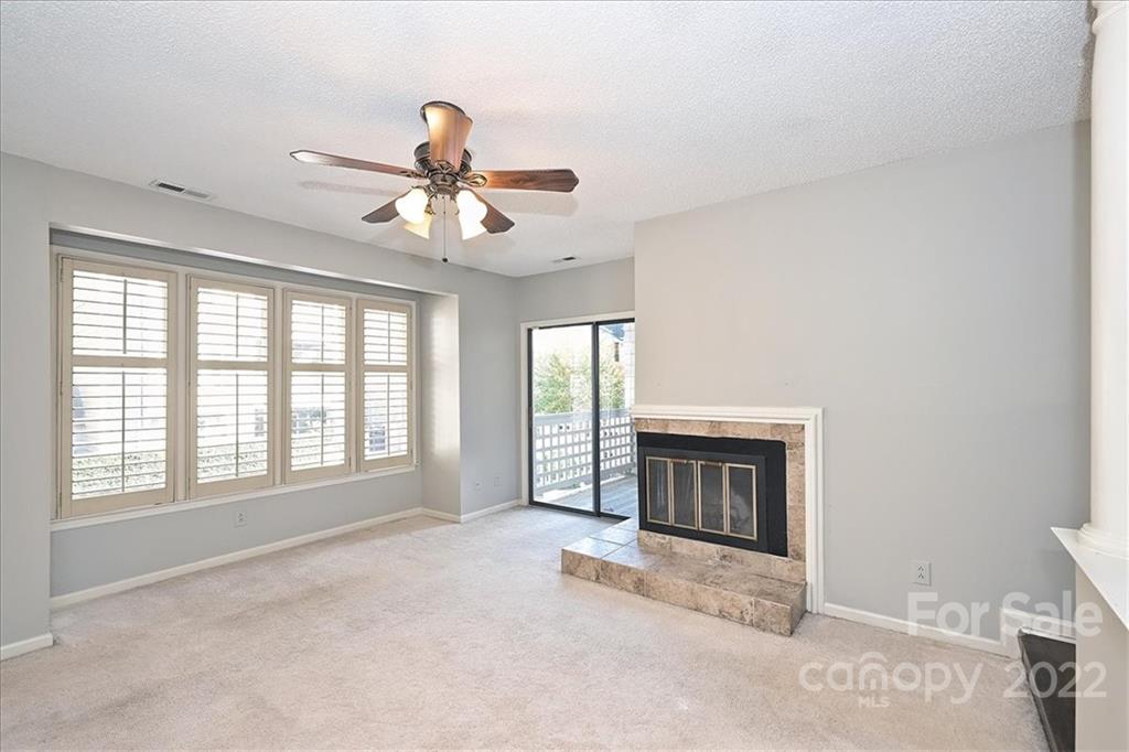 222 Queens Road, Unit 56 Charlotte, NC 28204 - Photo 10 of 23 a view of an empty room with a window