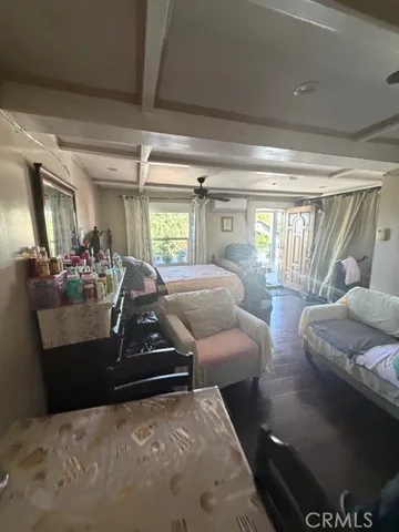 a kitchen with a sink appliances and cabinets