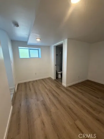 a bathroom with a toilet sink and shower