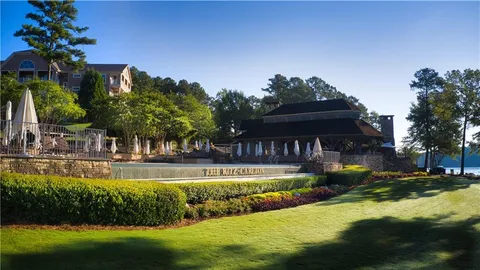 an aerial view of a golf course with chairs