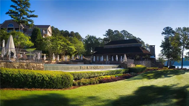 an aerial view of a golf course with chairs