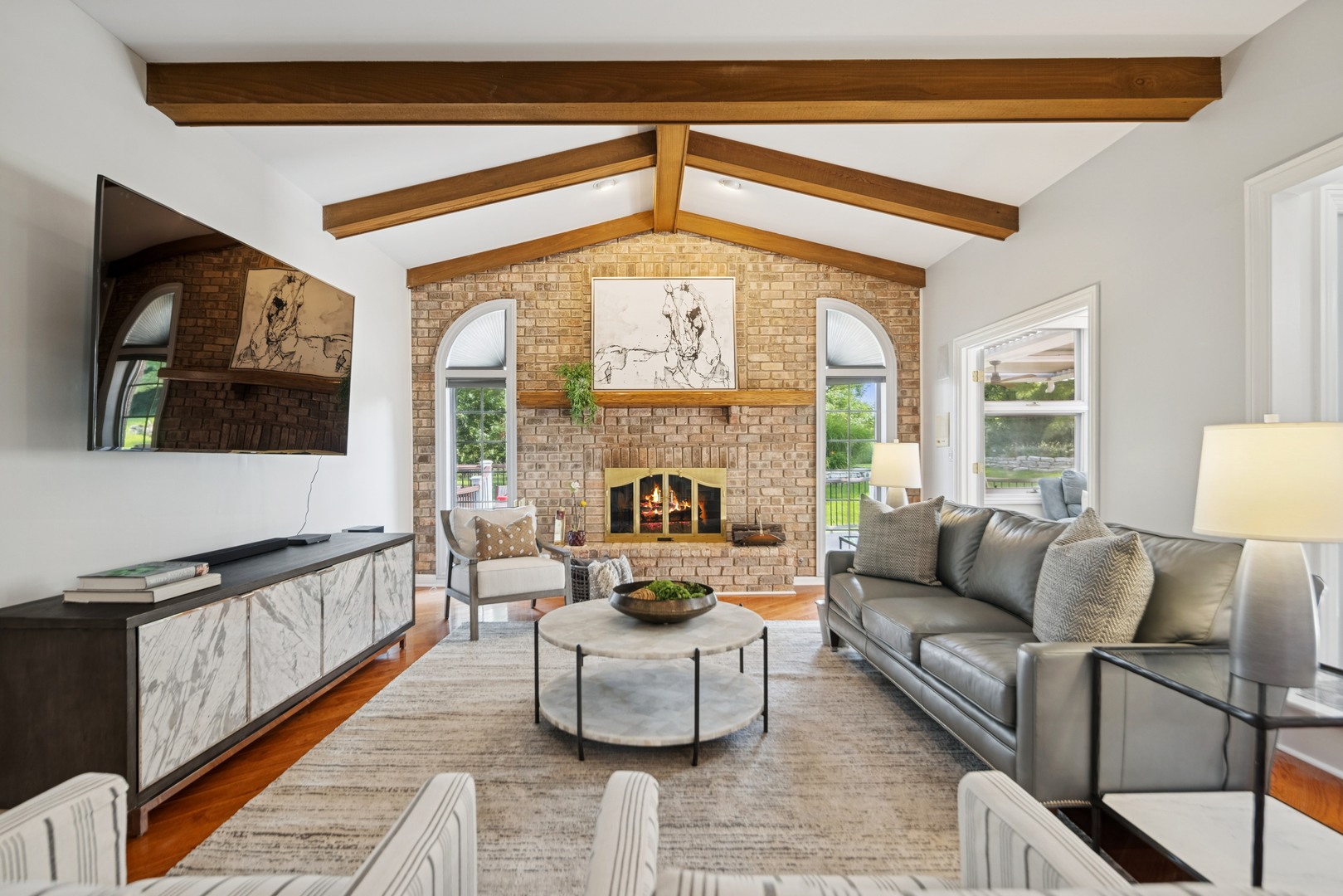 8120 Woodside Lane Burr Ridge, IL 60527 - Photo 9 of 24 a living room with furniture and a large window