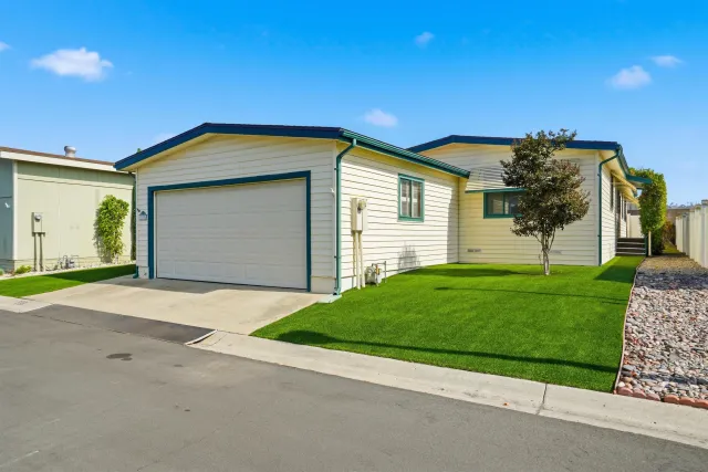 a house view with a garden space