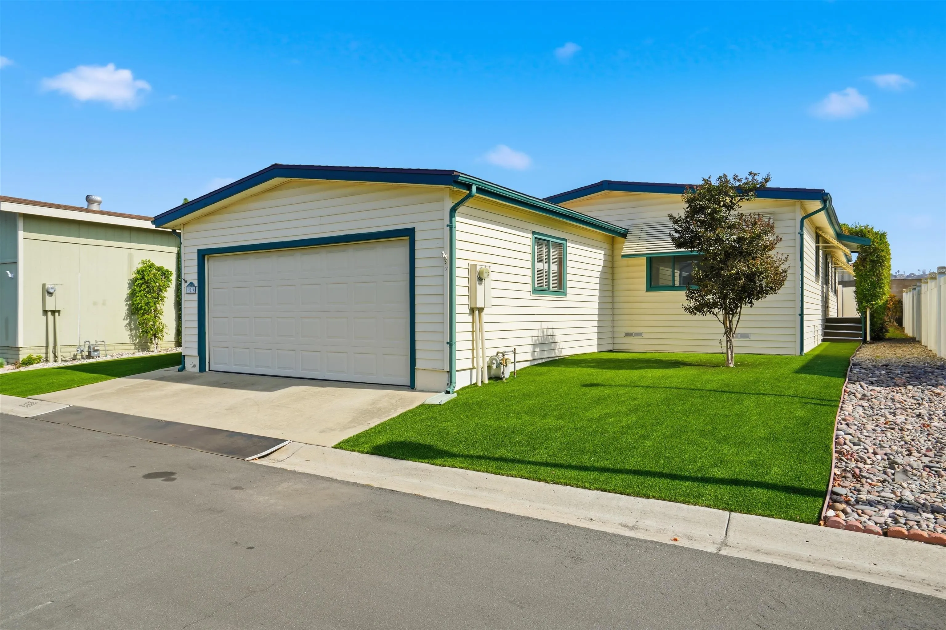 a house view with a garden space