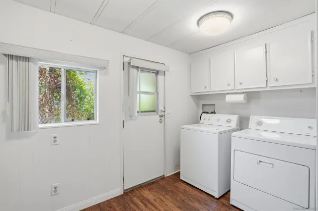 a view of a porch with wooden floor and stairs