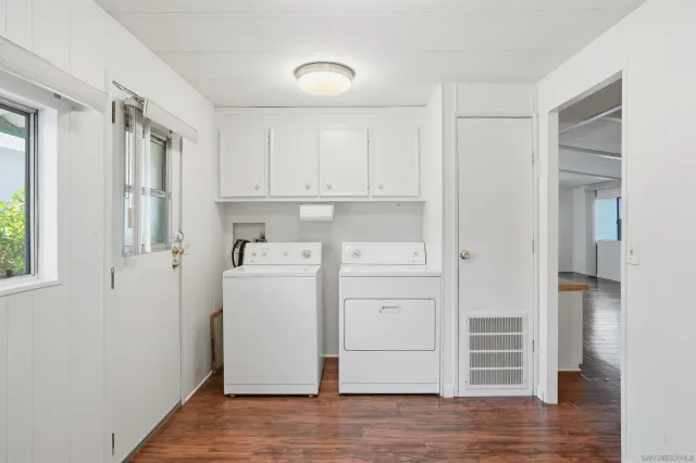 a view of a two chairs in the porch