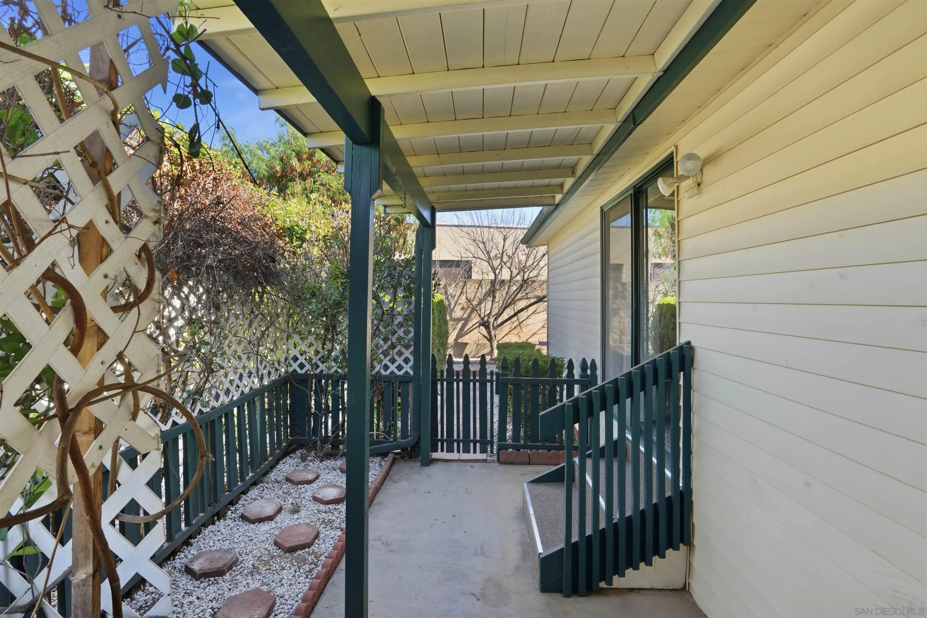 9255 North Magnolia Avenue, Unit 339 Santee, CA 92071 - Photo 33 of 55 a view of a porch with wooden floor and stairs