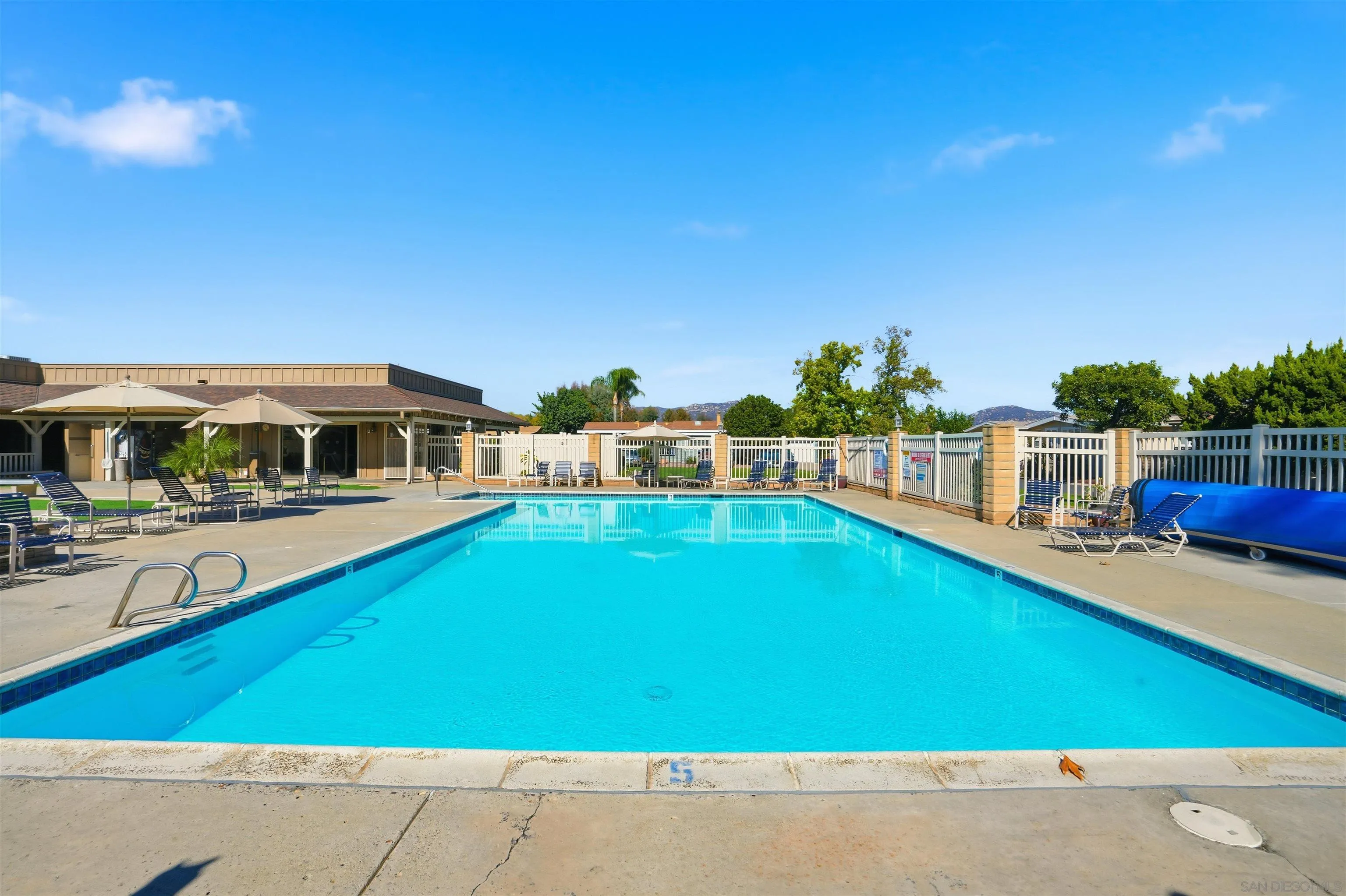 9255 North Magnolia Avenue, Unit 339 Santee, CA 92071 - Photo 44 of 55 a view of a house with swimming pool