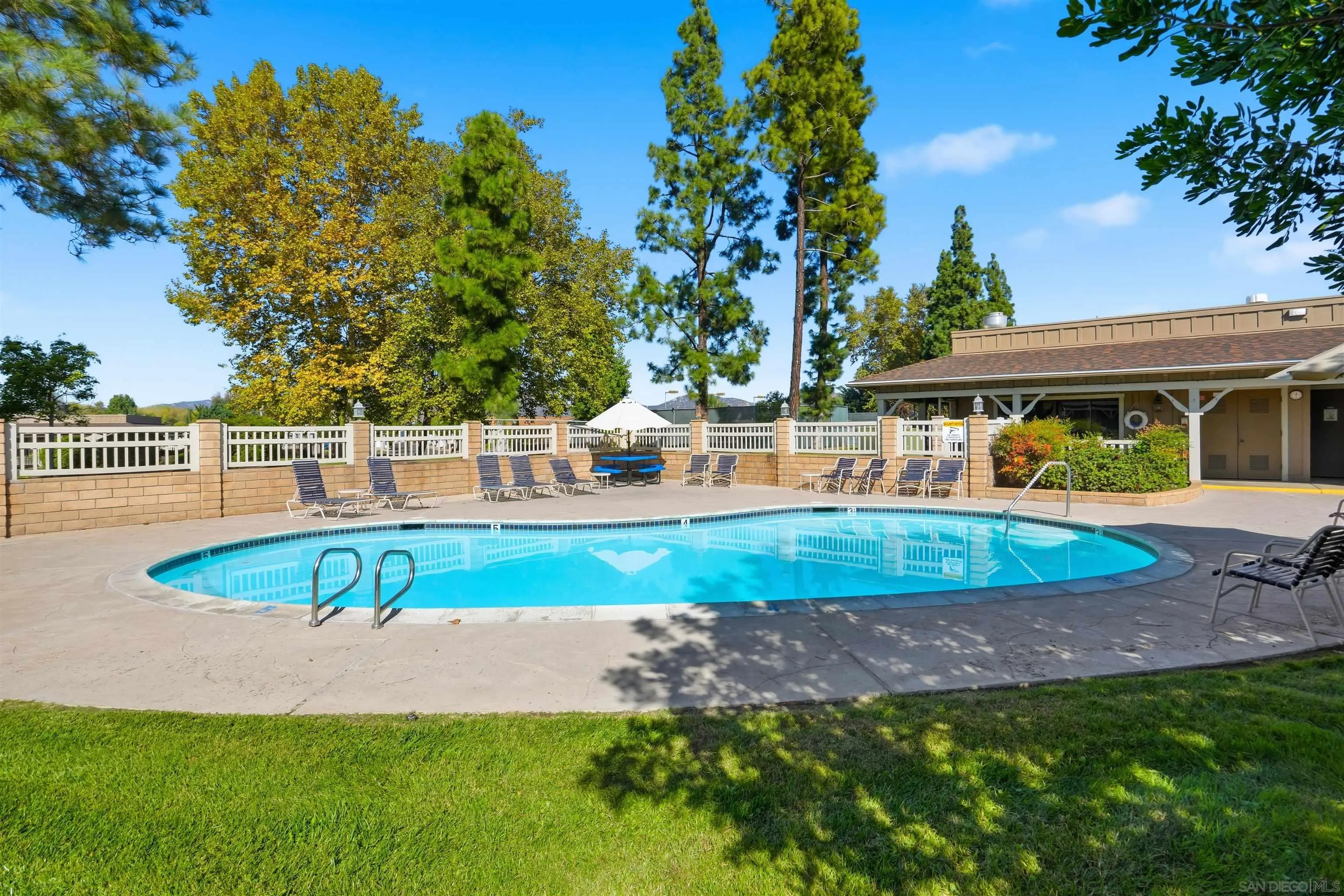 9255 North Magnolia Avenue, Unit 339 Santee, CA 92071 - Photo 47 of 55 a view of a swimming pool with a patio