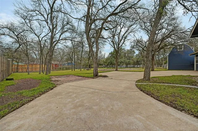 a view of a park with tree s