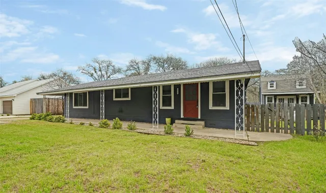 a front view of house with yard