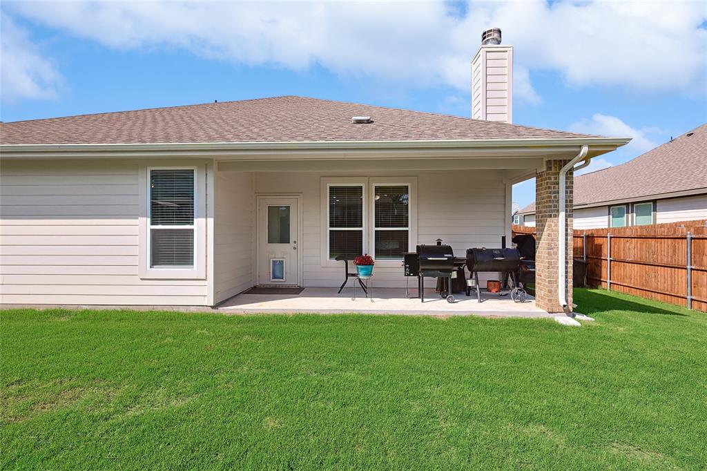 808 Feather Edge Drive Springtown, TX 76082 - Photo 37 of 40 a view of a house with backyard and porch