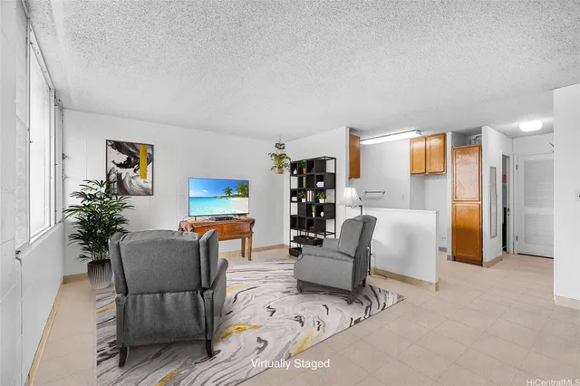 a living room with furniture and a couch