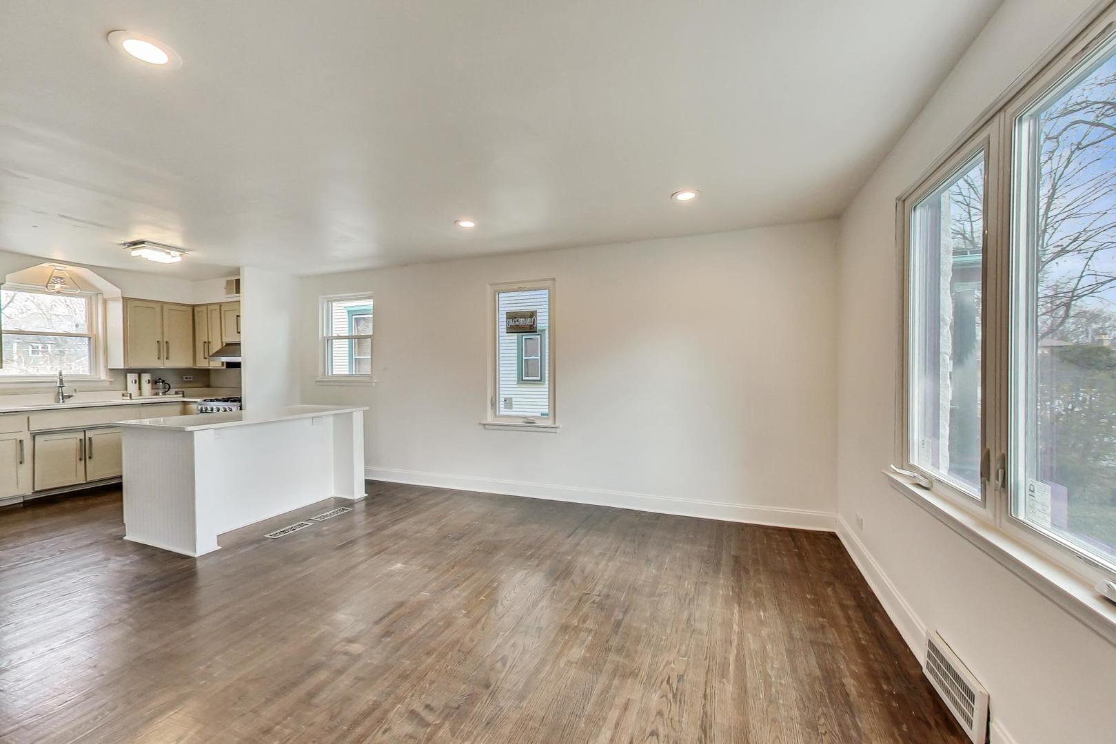 202 Lawton Road Riverside, IL 60546 - Photo 5 of 44 a view of kitchen with wooden floor and electronic appliances