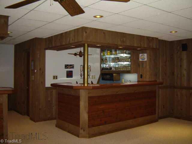 8000 Eastridge Road Oak Ridge, NC 27310 - Photo 5 of 8 Other. Wet bar built into the family room. Beautiful and perfect for entertaining guests or family get togethers.