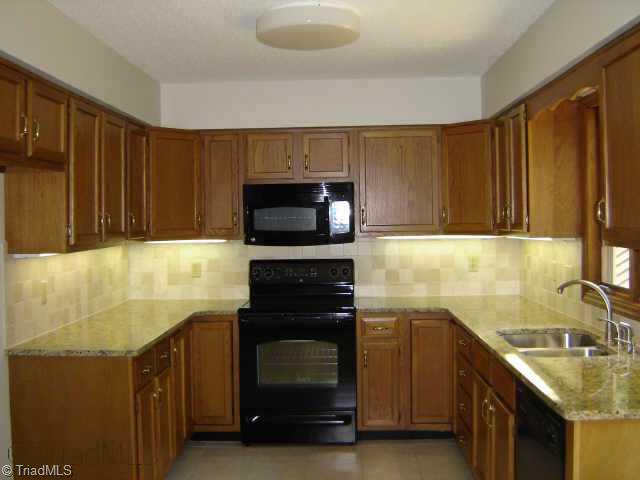 8000 Eastridge Road Oak Ridge, NC 27310 - Photo 6 of 8 Other. New granite countertops, ceramic floors and new appliances. BEAUTIFUL!!!!