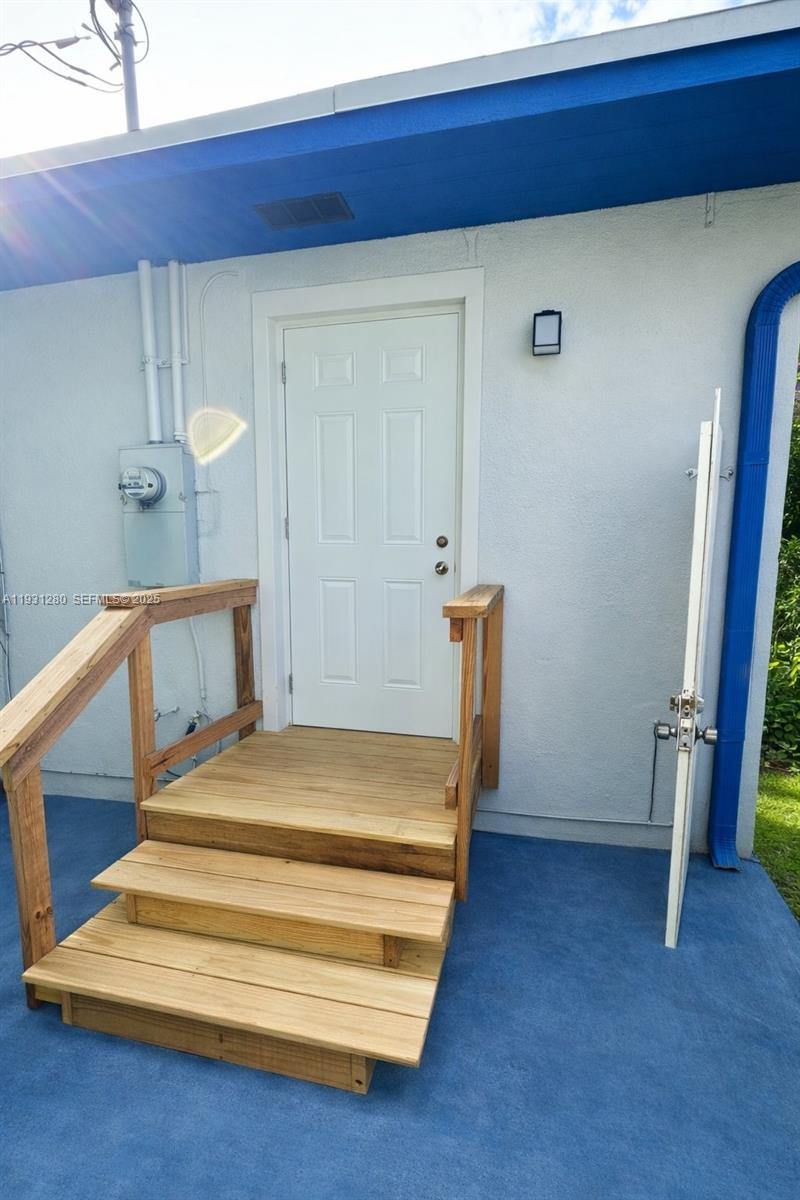 6260 Southwest 24th Street, Unit B Miami, FL 33155 - Photo 2 of 13 a bathroom with a sink and a mirror