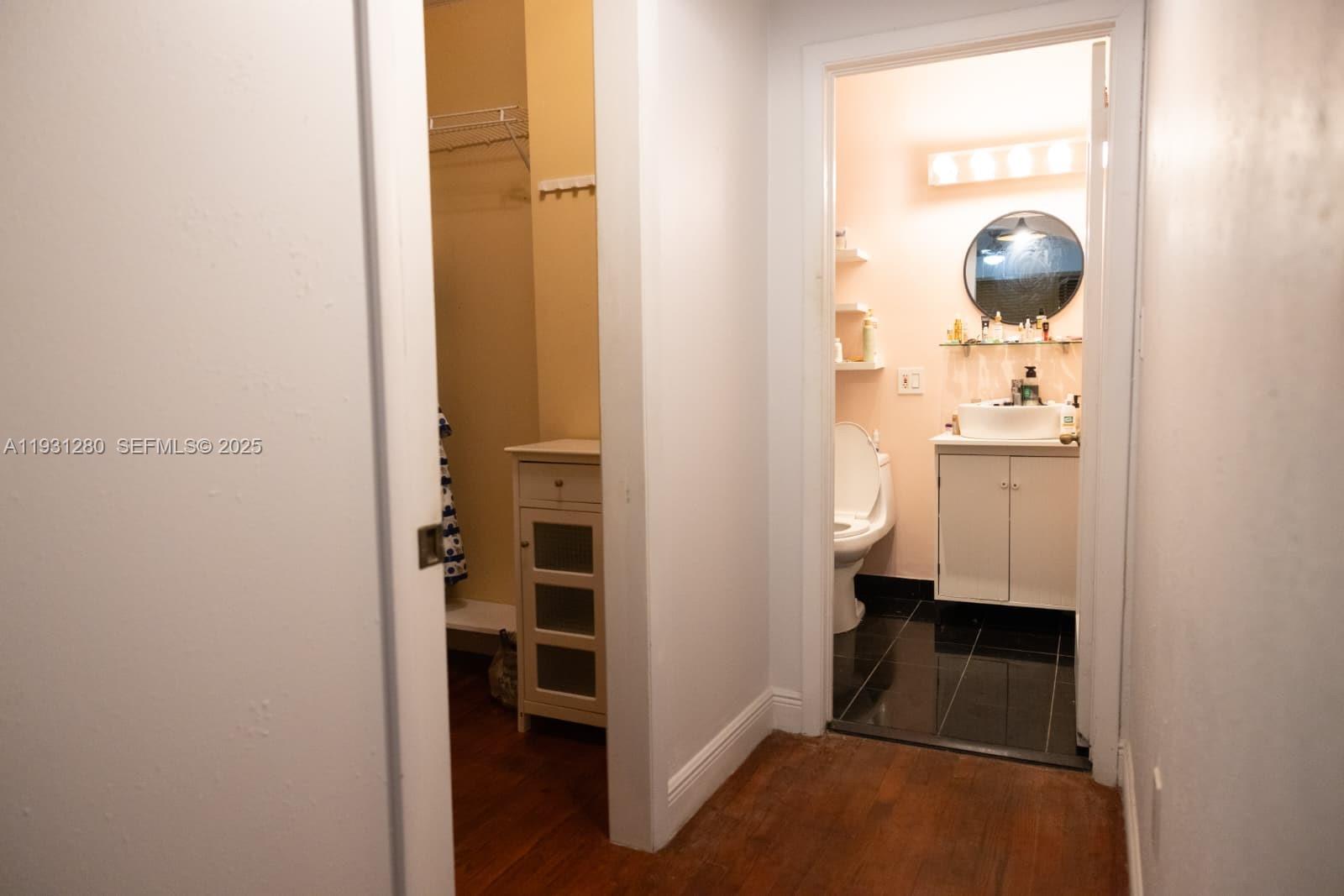 6260 Southwest 24th Street, Unit B Miami, FL 33155 - Photo 10 of 13 a view of hallway with walk in closet and a window