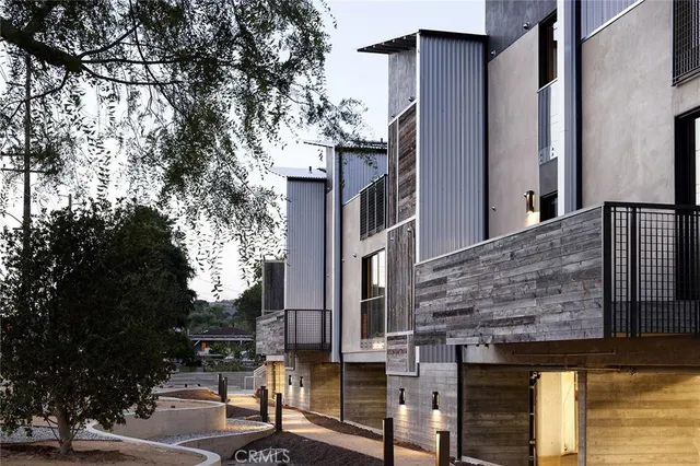 a view of a kitchen with furniture and cabinets