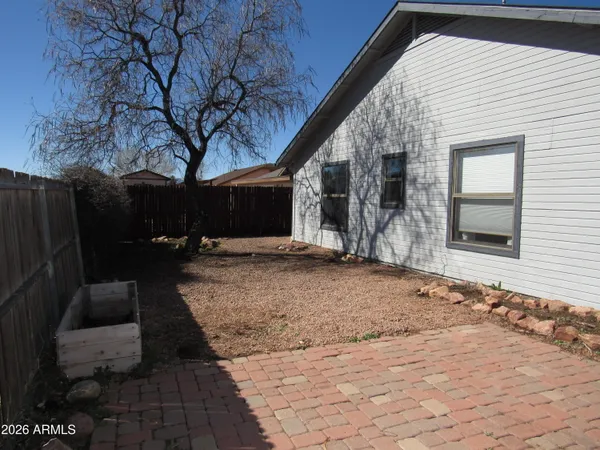 a backyard of a house with seating space