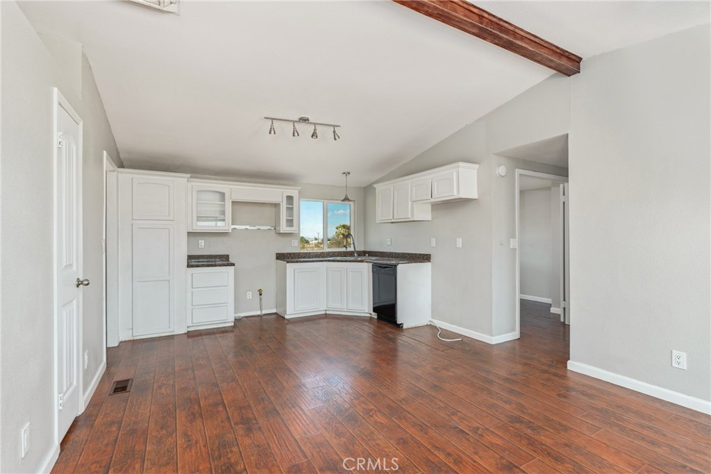 6320 Cholame Road Phelan, CA 92371 - Photo 13 of 33 a view of kitchen with wooden floor and electronic appliances