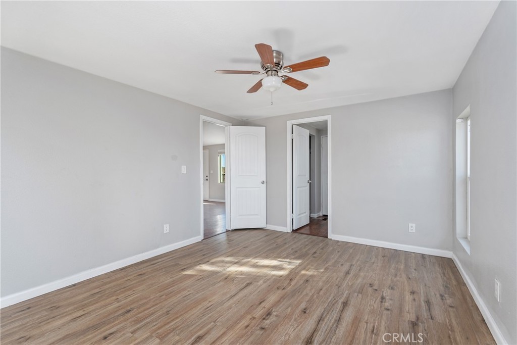 6320 Cholame Road Phelan, CA 92371 - Photo 15 of 33 a view of empty room with wooden floor