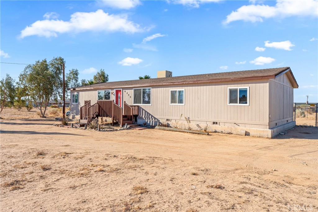 6320 Cholame Road Phelan, CA 92371 - Photo 2 of 33 a view of a house with snow on the road