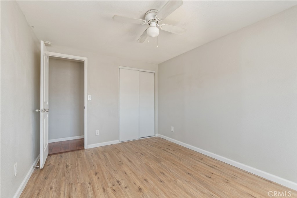 6320 Cholame Road Phelan, CA 92371 - Photo 29 of 33 a view of empty room with wooden floor